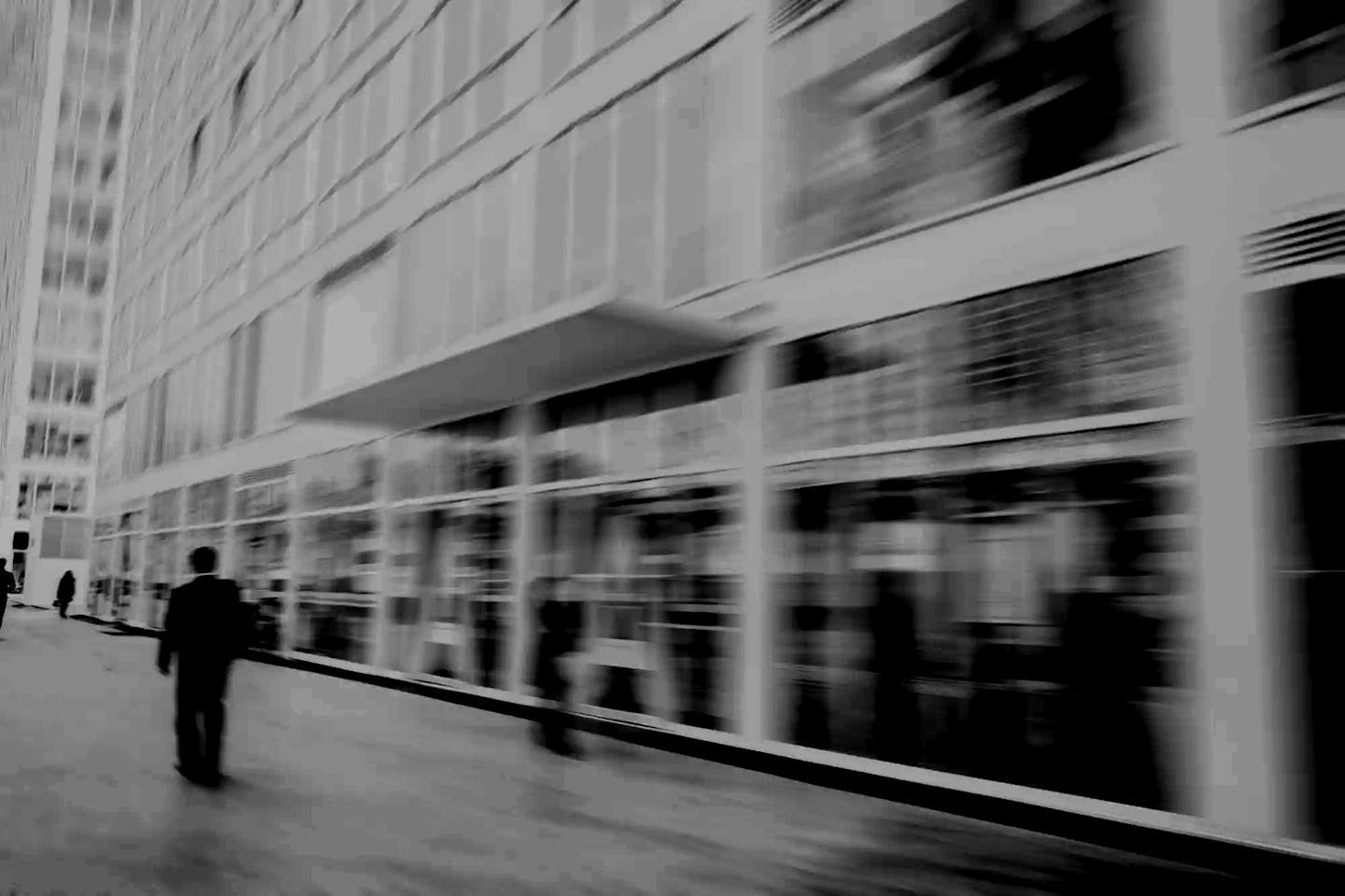 People walking in the business district, motion blur