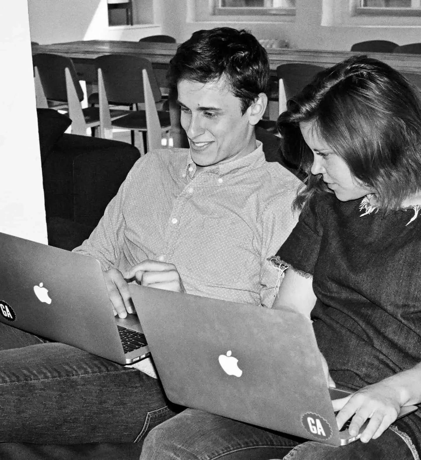 Students in classroom on Apple computers